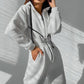 Komfortabel ensfarget jumpsuit med hette for kvinner