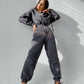 Komfortabel ensfarget jumpsuit med hette for kvinner