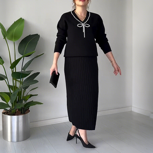 Elegant todelt sett med bluse og skjørt med strassbue for kvinner