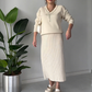 Elegant todelt sett med bluse og skjørt med strassbue for kvinner