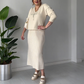 Elegant todelt sett med bluse og skjørt med strassbue for kvinner