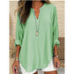 Casual ensfarget bluse med V-hals for kvinner