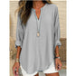 Casual ensfarget bluse med V-hals for kvinner