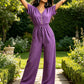 Jumpsuit med V-hals og figursydd midje for kvinner