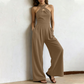 Elegant jumpsuit med kryssende halterneck